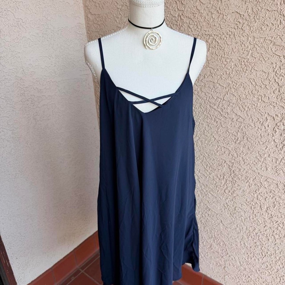 Navy blue slip dress with adjustable straps and open back